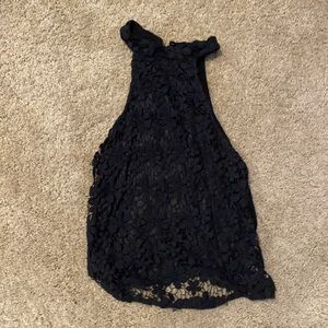 Open back black halter top with high neck and eye kit detail not sheer